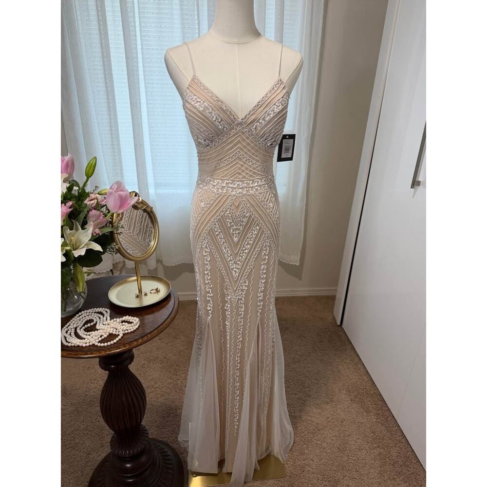 Elegant Marina designer beaded gown in a stunning champagne/nude tone. NWT